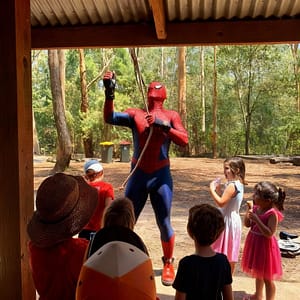 Spyder Man in action – web-slinging superhero party entertainer Sydney leading interactive party games for Sydney kids’ parties.
